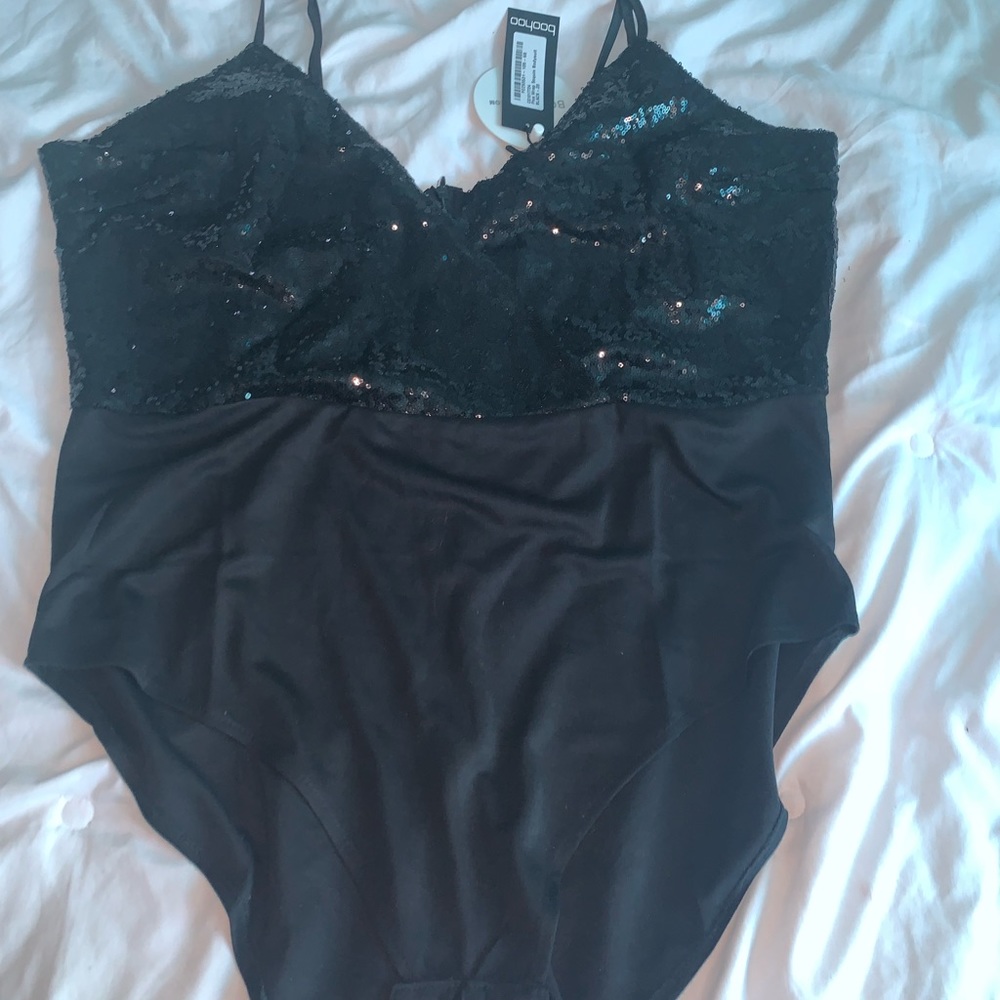 Brand new!  Sequin top bodysuit with zippered back. Gorgeous!
